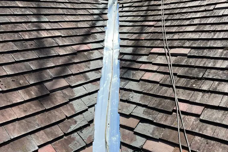 Repair to roof valley on pitched roof by Jacobs Roofing Services Ltd.